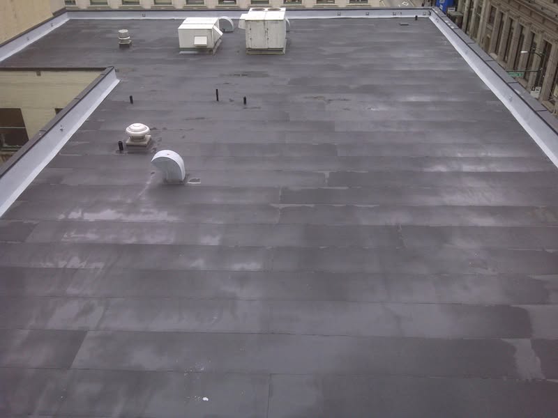 Downtown commercial flat roof with torch-on membrane in Vancouver, BC by Roofking