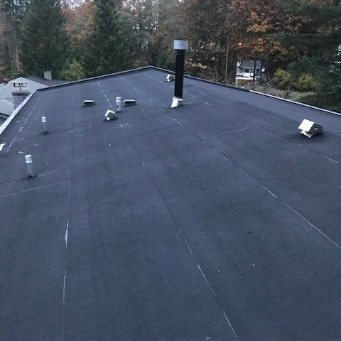 Completed residential torch-on flat roof in North Vancouver, BC by Roofking