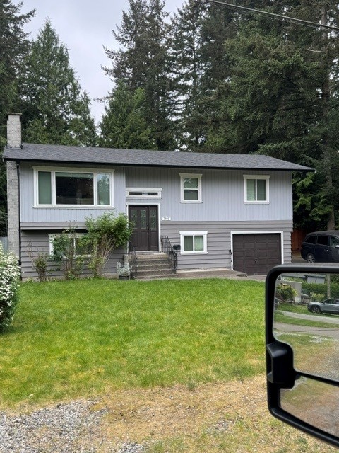 Split-level home with completed shingle re-roof in Langley, BC by Roofking