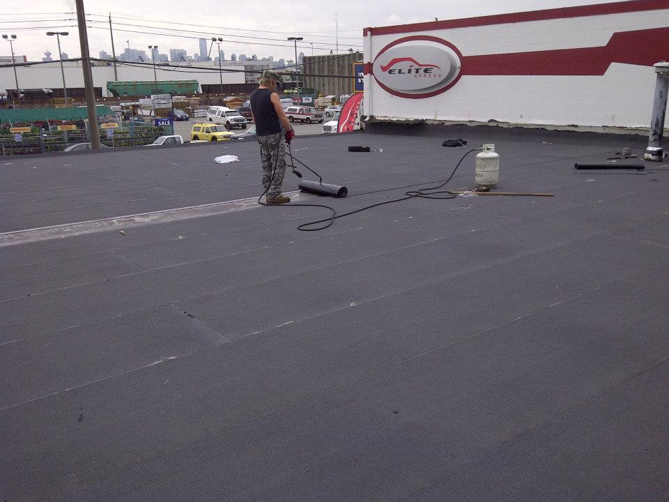 Torch-on membrane install on commercial building in Vancouver, BC by Roofking